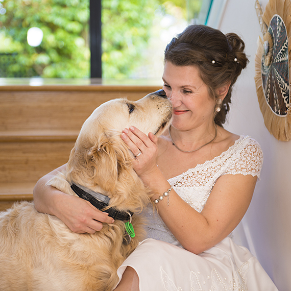 bride and her golden retriever
