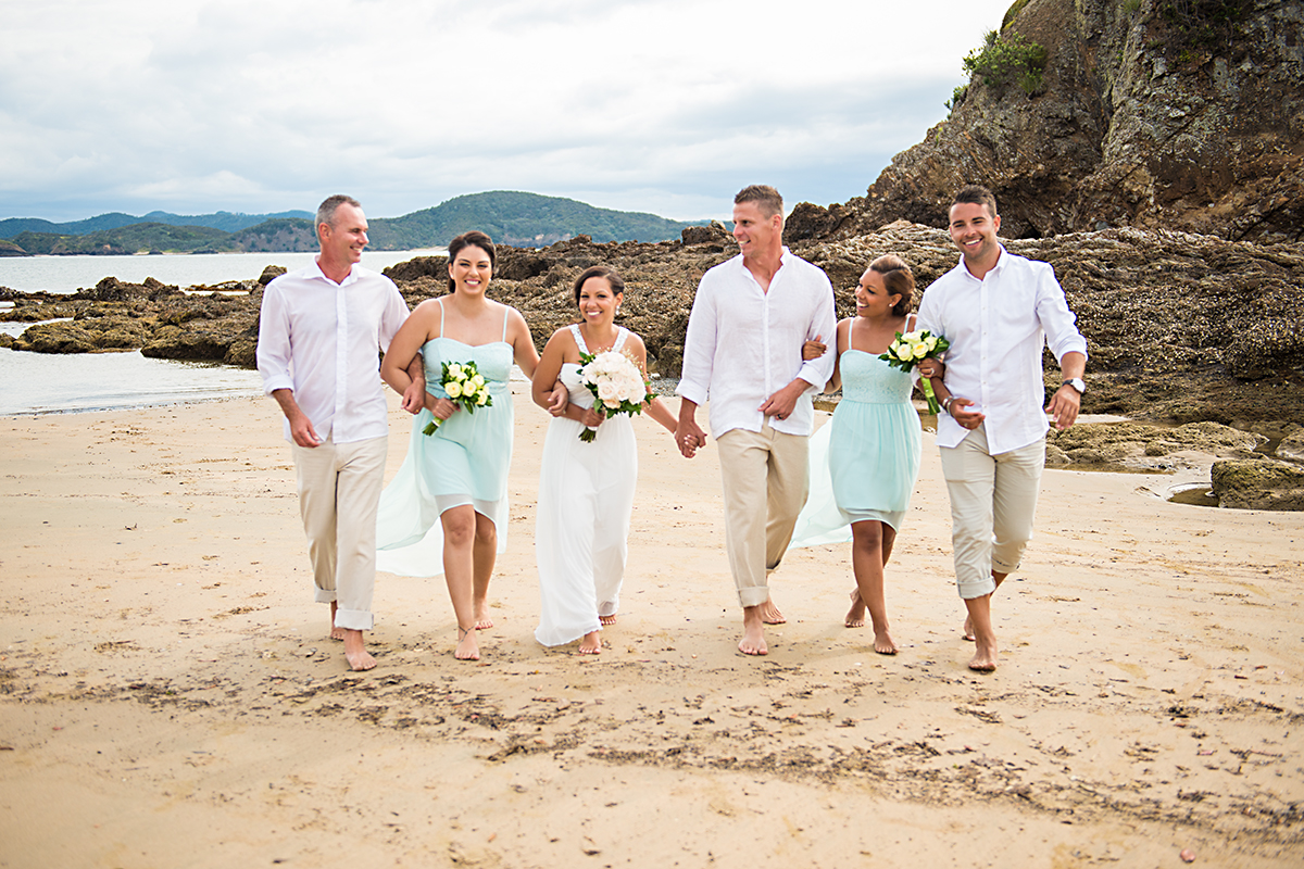 bridal party on the beach