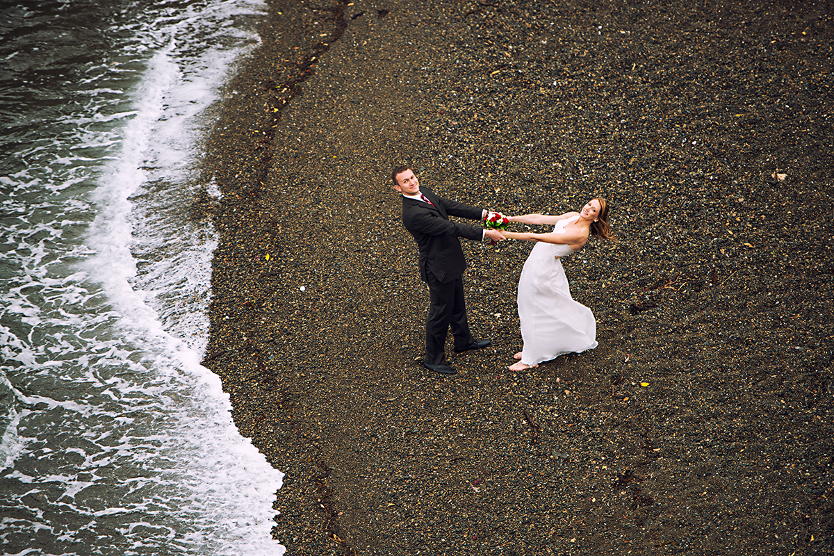bride and groom on a beach NZ